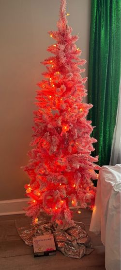 Pink flocked Christmas tree with lights