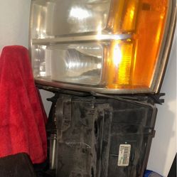 2013 GMC Sierra OEM Headlights 