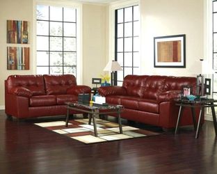 Bold red tufted couch and Loveseat