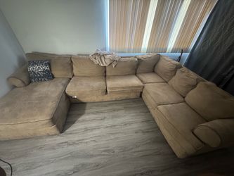 Brown suede sectional couch