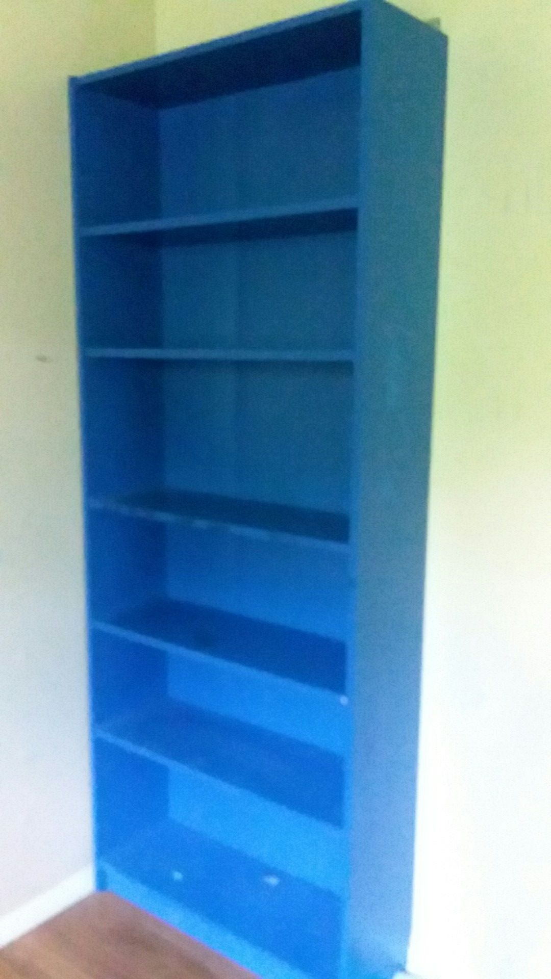Bookshelves red and blue