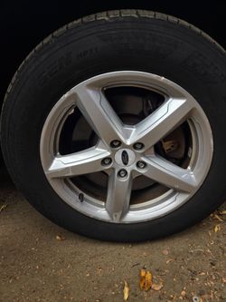 Ford 5-Spoke Silver Alloy Wheel with Tire
