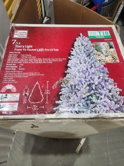 Home Accents Holiday 7.5 ft Flocked Pre-Lit Christmas Tree