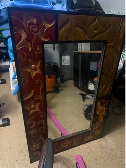 Large carved wood wall mirror