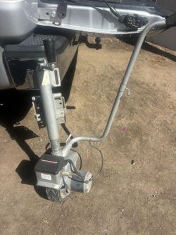 Motorized trailer jack / power mover