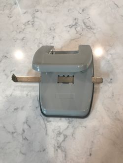 Two hole puncher