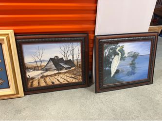 Large and small paintings and frames