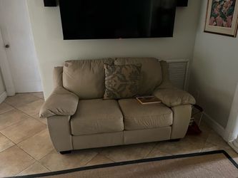 Free leather loveseat and matching chair