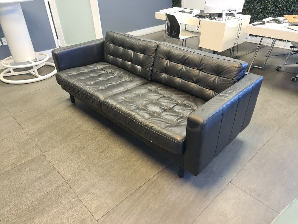 Black leather sofa