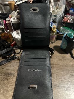 Safe the girls touched screen phone cross body handbag.