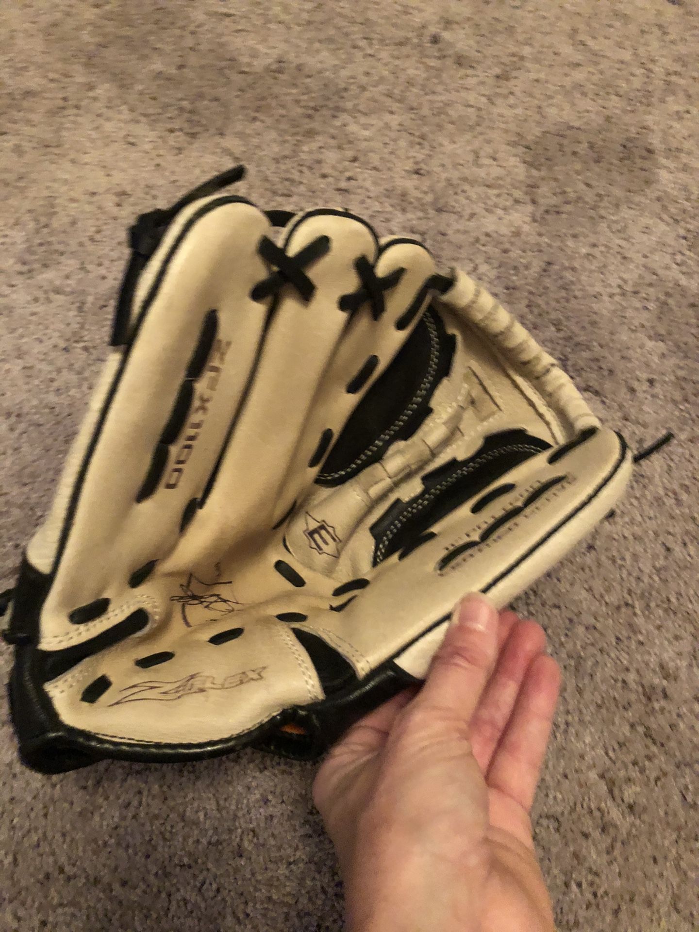 Child’s baseball glove. Great for practice