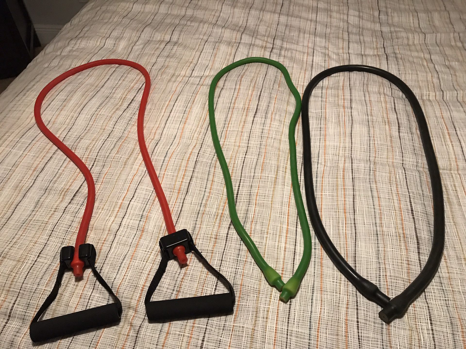 P90x exercise DVD, resistance bands, guides