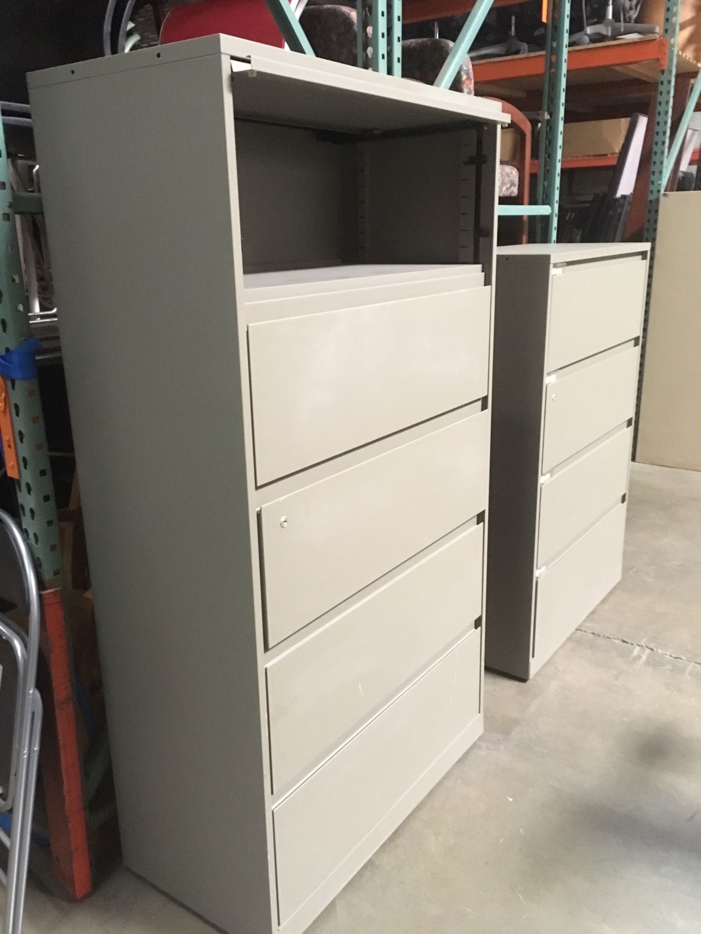 Medium gray steel case file cabinets in different sizes all lateral