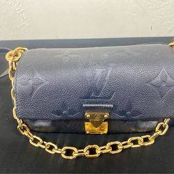 Louis Vuitton Black Empreinte Leather Handbag