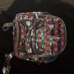 Wonder Nation girls' mini backpack features reversible pink, blue, and silver sequins.