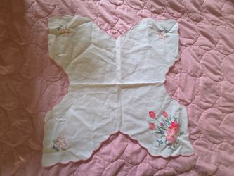 Box full vintage linens from dollies, 2 round beautiful table clothes, table dresser clothes take all $20