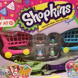 Shopkins Playset toy of 4 shopping carts, 4 shopkins plus a board game, two for one price. No longer available at Target. Miami, Fl