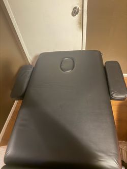 Massage table