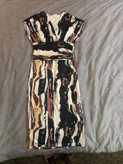Earth-tone abstract print midi dress for fall styling