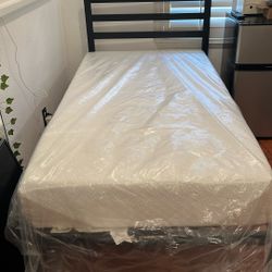 Twin black bed frame + mattress 