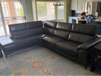 Leather Sectional with power Recliner