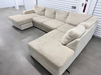 Cream sectional with chaise lounger
