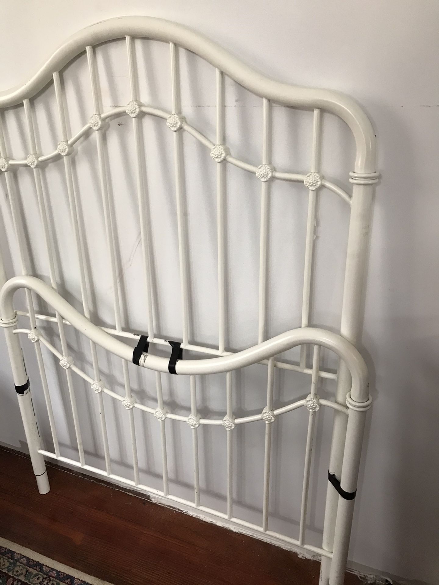 White metal twin size bed with headboard and footboard included