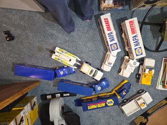 NAPA toy trucks/trailers/boat
