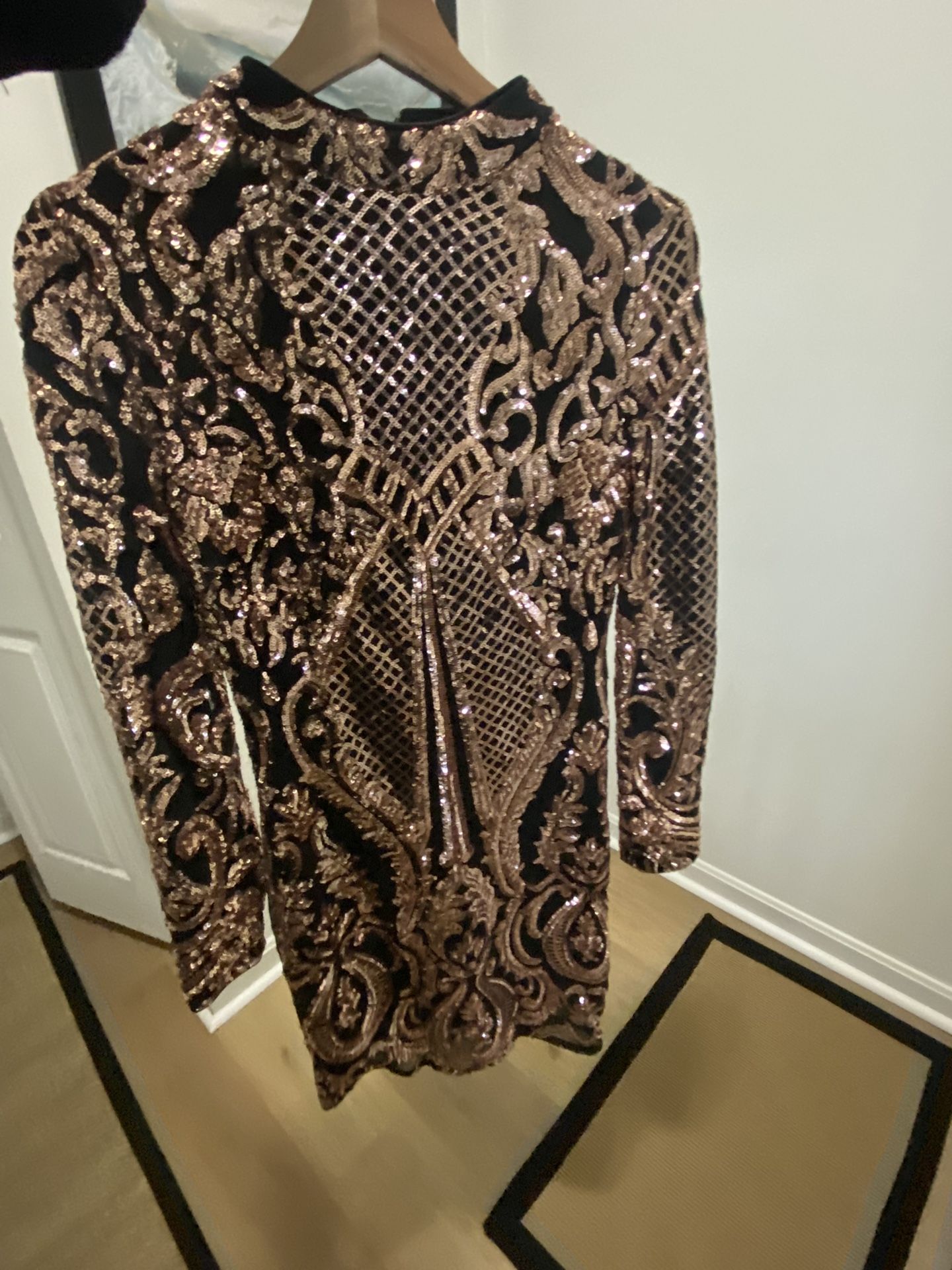 Black and gold sequence dress