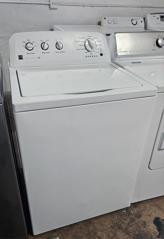 KENMORE WASHER MACHINE.