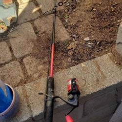 Fishing Pole Comes With Bag Of Random Gear