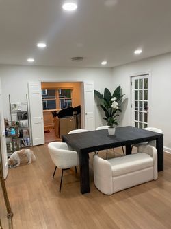 CB2 couch & coffee table, black table, boucle chairs, mirror, furniture