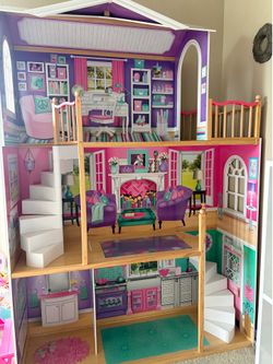 Wooden dollhouse with furniture 5 feet tall