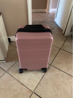 Carry on pink suitcase