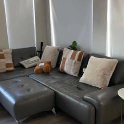 Leather Sectional in ottoman