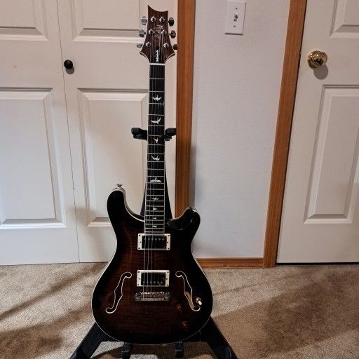 Yellow ERIC Johnson Stratocaster And Brown Is PRS SE Hollow Body