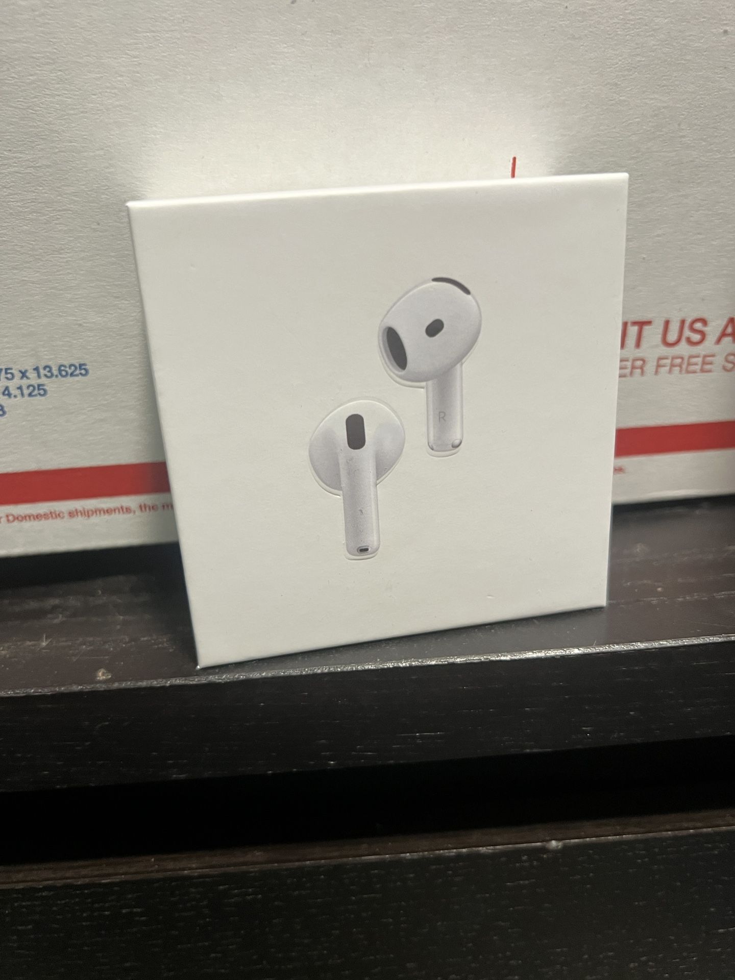 Brand New AirPods 4 ANC are wireless earbuds with active noise cancellation. They feature a white color, in-ear form factor with a double earpiece des