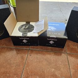 Two 10" Rockford Fosqate Subwoofers With Housings