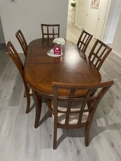 Sale Table with 6 chairs and china cabinet