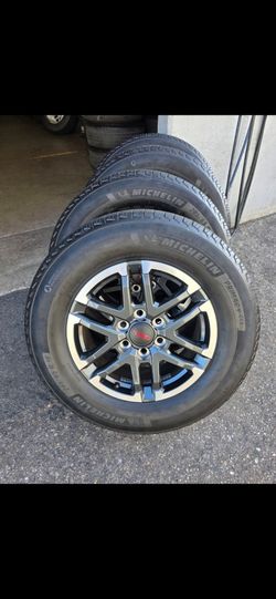 18" Toyota Tacoma OEM rims w/ 265-65R18 Michelin tires