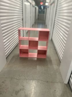 Pink 9 cubby storage shelf system. Sturdy & clean