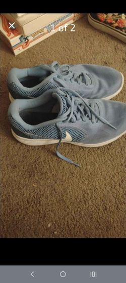 Size 8 women blue Nike tennis shoes used