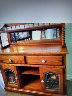 Dry bar oak perfect.Heavy mirror is perfect.All drawers and doors work great.Very heavy vintage