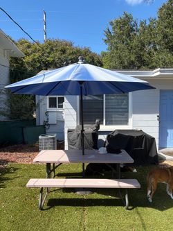 Picnic table and umbrella
