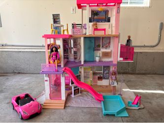 Barbie Dream House, Car, Cabana, four dolls and furniture