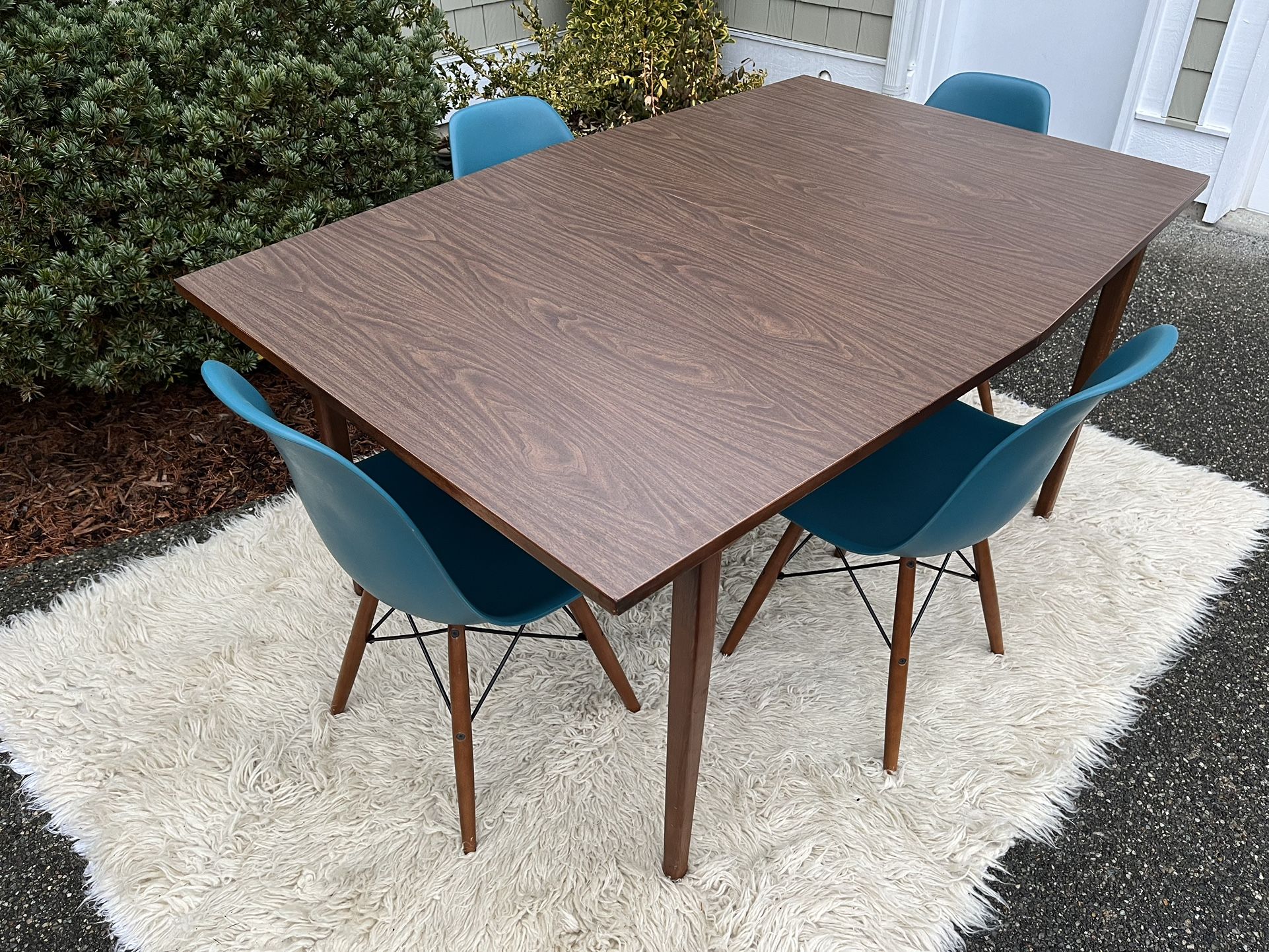 1960s Mid Century Modern Boat Shape Walnut Color Wood And Formica Dining Table 