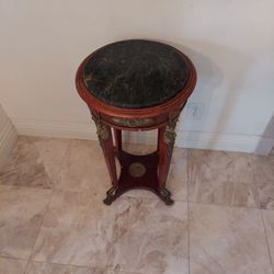 Clean Wooden Marble Stand.