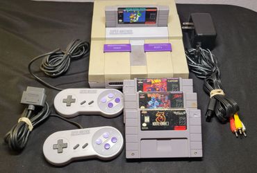 Nintendo Super Nintendo Entertainment System (SNES) Console Bundle with 4 Games