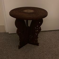 A Small Table With Design