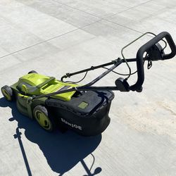 Sun Joe corded electric mower used